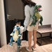 Ryggsäck med realistiskt dinosauriemotiv